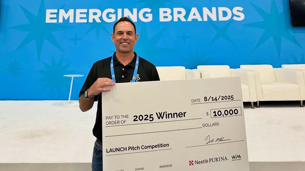 Matt Terrill with 10,000 1st place check at Launch Pirch Competition - Superzoo 2025